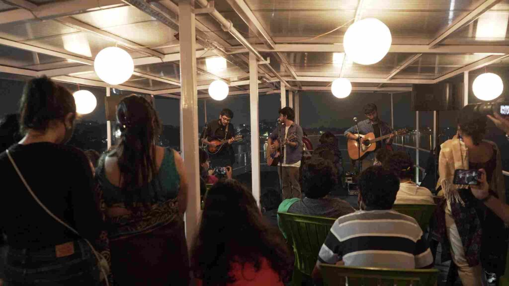 Concert and talk on the barge along the river. Photo: Parameshwar Haldar