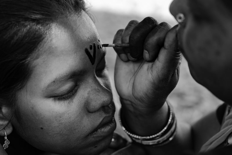 Artist Mangla Bai at work. Photo: M. Sahana Rao / The Godna Project